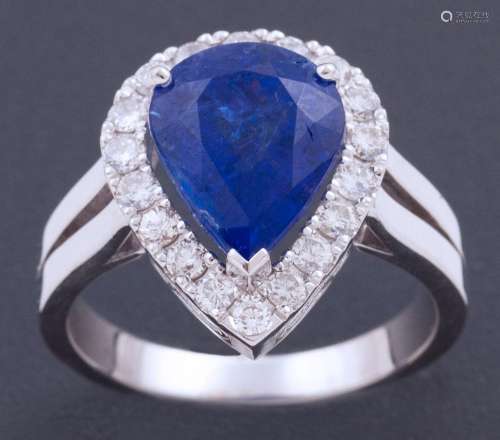 RING MADE OF 18 KT GOLD WITH TANZANITE AND DIAMONDS _<br />
...