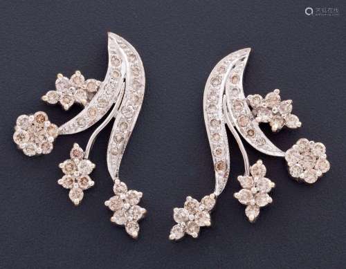 PAIR OF EARRINGS WITH FLORAL MOTIFS COMPOSED OF DIAMONDS AND...