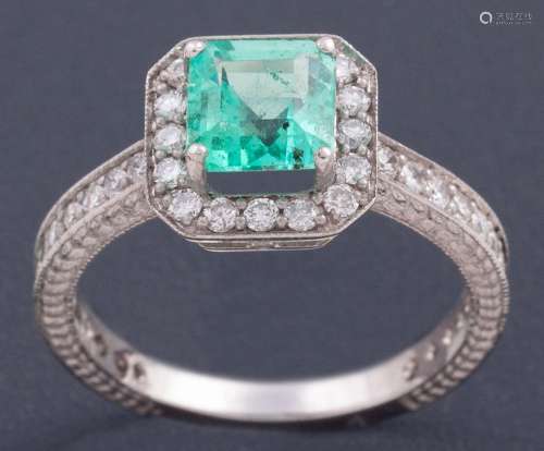 RING WITH CENTRAL EMERALD WITH DIAMOND BORDER IN 18 KT GOLD ...