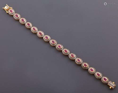 BRACELET IN SILVER PLATED WITH RUBIES AND DIAMONDS.<br />
El...