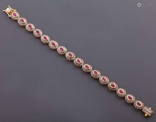 BRACELET IN SILVER PLATED WITH RUBIES AND DIAMONDS.<br />
El...