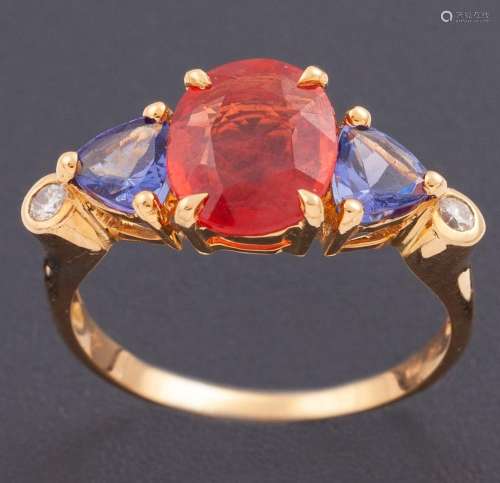 RING WITH CENTRAL SAPPHIRE ACCOMPANIED BY TANZANITES AND DIA...
