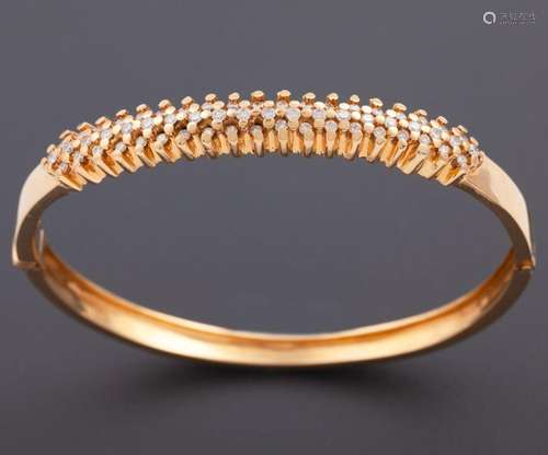 RIGID BRACELET MADE OF 18 KT GOLD AND DIAMONDS _<br />
rigid...