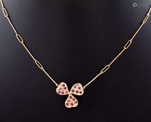 NECKLACE MADE IN 18 KT YELLOW GOLD AND PENDANT WITH RUBIES A...