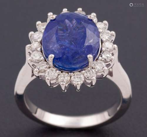 RING MADE IN 18 KT GOLD WITH TANZANITE AND DIAMONDS_.<br />
...