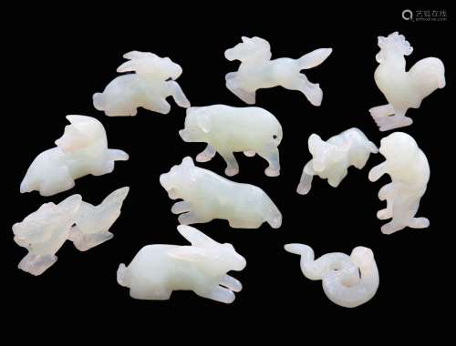 SET OF 11 CARVED JADE FIGURES REPRESENTING THE CHINESE HOROS...