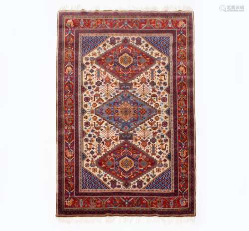 WOOL CARPET WITH GEOMETRIC DECORATION IN THE FIELD AND BORDE...