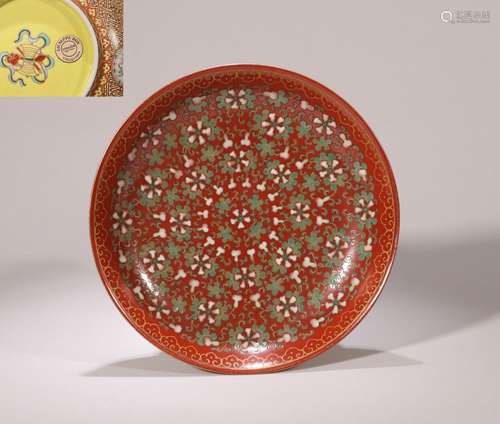 CHINESE PORCELAIN RED GROUND FAMILLE ROSE GOURD PLATE