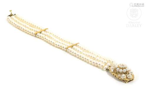 Pearl bracelet in 18k yellow gold