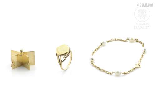 Three-piece set in 18k yellow gold