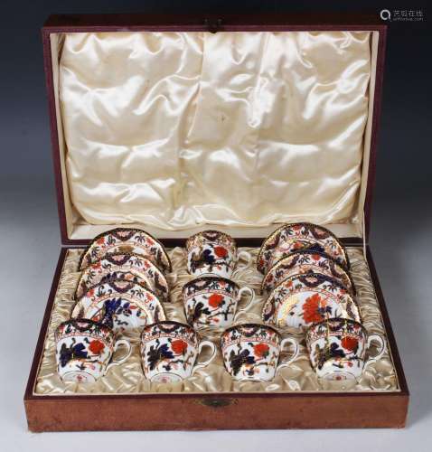 A set of six Royal Crown Derby coffee cups and saucers