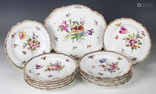 A set of twelve Meissen porcelain outside factory painted de...