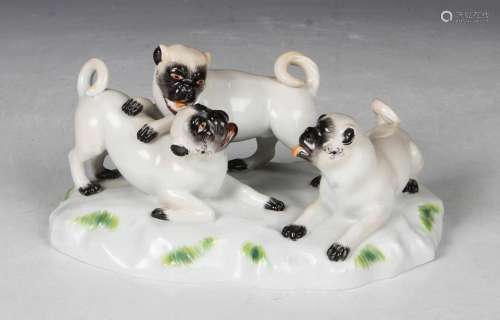 A Meissen porcelain pug dog group