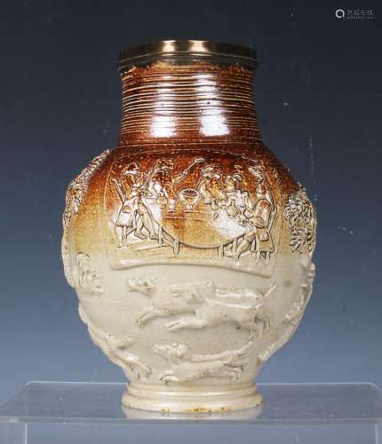 A rare Mortlake stoneware hunting jug