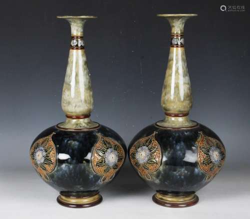A large pair of Royal Doulton stoneware bottle vases
