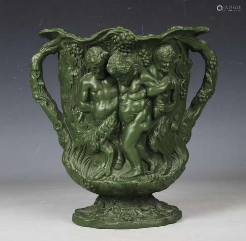 A Minton relief moulded two-handled Silenus vase in dark gre...