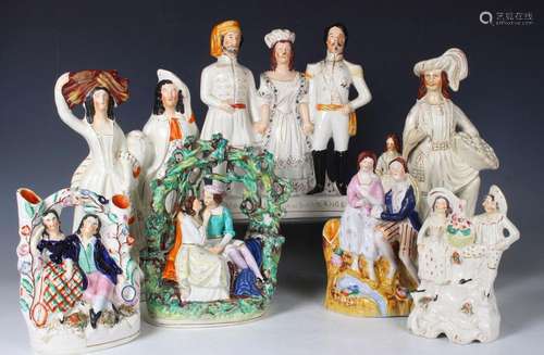 A collection of Staffordshire pottery figures