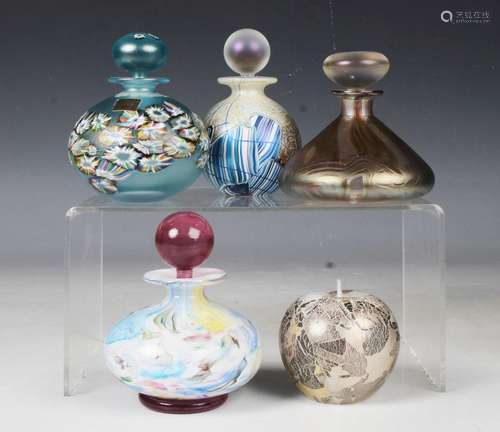 Four Isle of Wight glass perfume bottles and stoppers