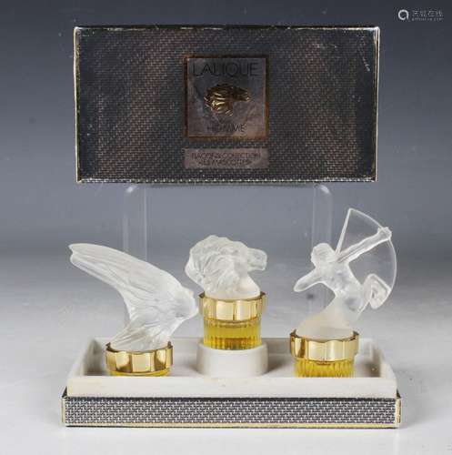 A set of three Lalique miniature Mascots Collection Flacons