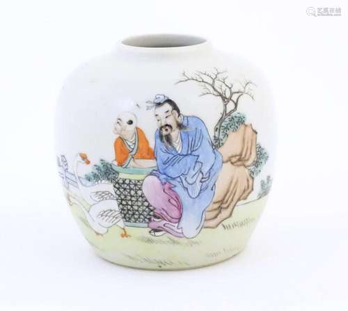 A Chinese jar / vase decorated with figures in a landscape. ...