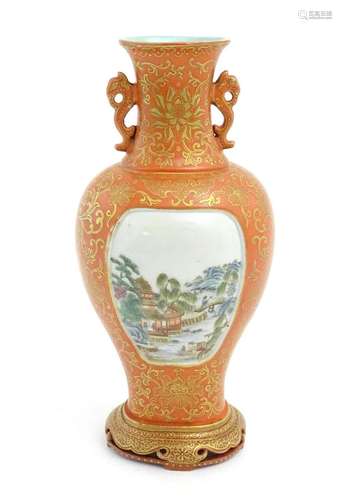 A Chinese vase with a burnt orange ground decorated with gil...