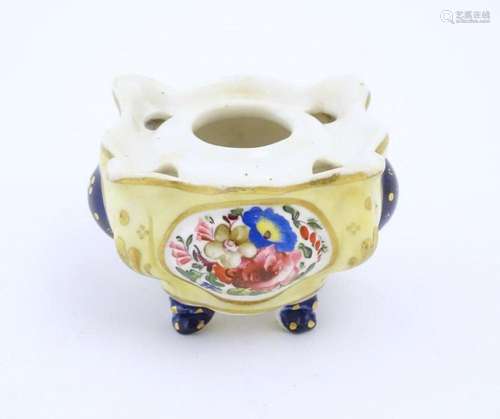 A Continental porcelain inkwell of shaped form with floral a...