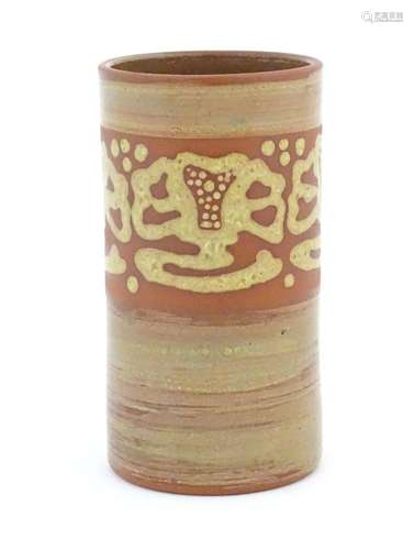 A terracotta studio pottery vase of cylindrical form with ba...