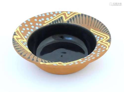 An Australian studio pottery terracotta bowl by John Clift (...