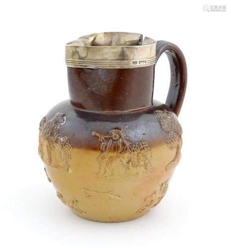 A Doulton two tone stoneware jug with a silver rim hallmarke...