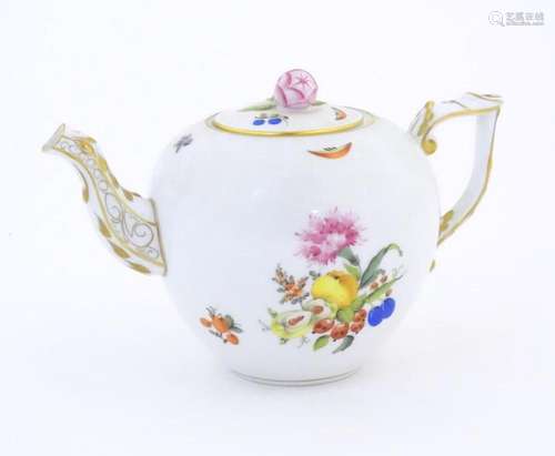 A Herend pottery teapot decorated in the pattern Fruits &...