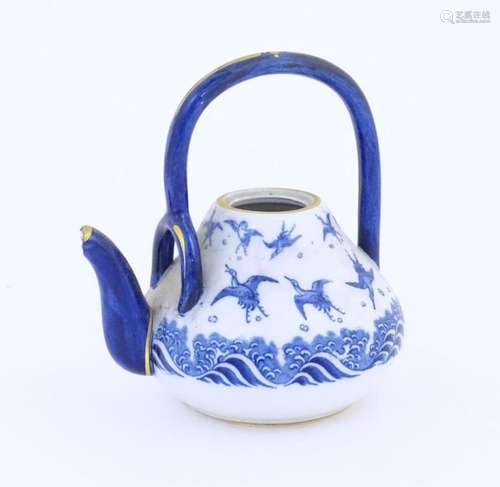 A Minton teapot decorated in the pattern Japanese Crane, des...