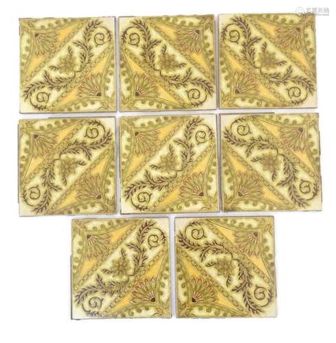 Eight Italian tiles of square form with stylised floral and ...