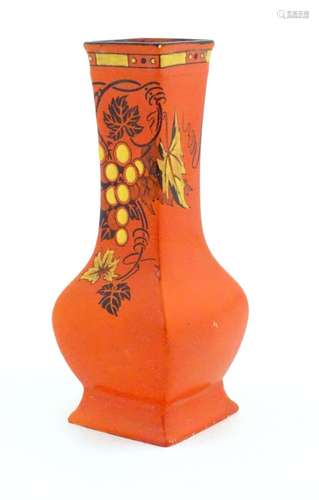 A Shelley vase with a burnt orange ground decorated in the p...