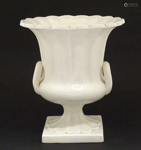 A Bretby vase of campana urn form. Marked under. Approx. 10 ...