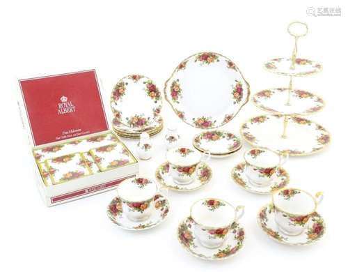 A quantity of Royal Albert tea wares in the Old Country Rose...