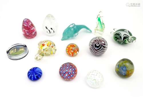 A quantity of assorted art glass paperweights and models to ...