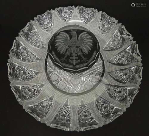 A cut crystal dish with eagle decoration. 12" diameter