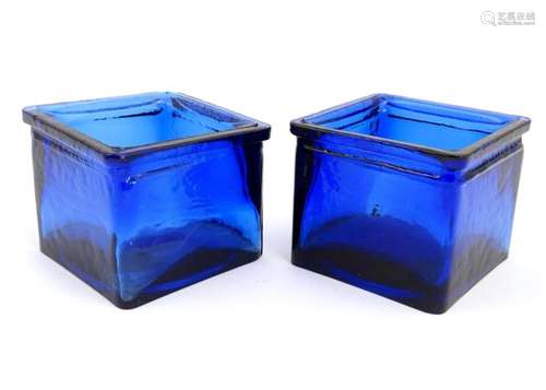 Two blue glass jardinieres of squared form. Approx 4" h...