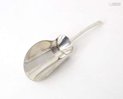 A silver caddy spoon / sugar shovel hallmarked London 1981, ...