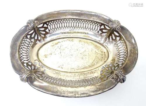 A silver bon bon dish of oval form with pierced decoration, ...