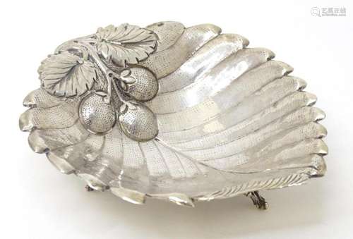 A Continental silver dish of leaf form with strawberry detai...