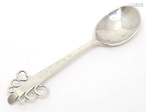 An Art Deco Arts & Crafts style silver teaspoon with ham...