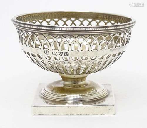 A silver pedestal bon bon dish with pierced decoration, hall...