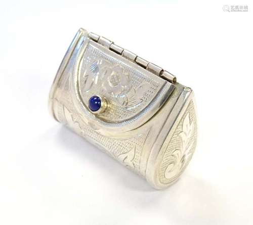 A white metal novelty box / pill box formed as a purse with ...