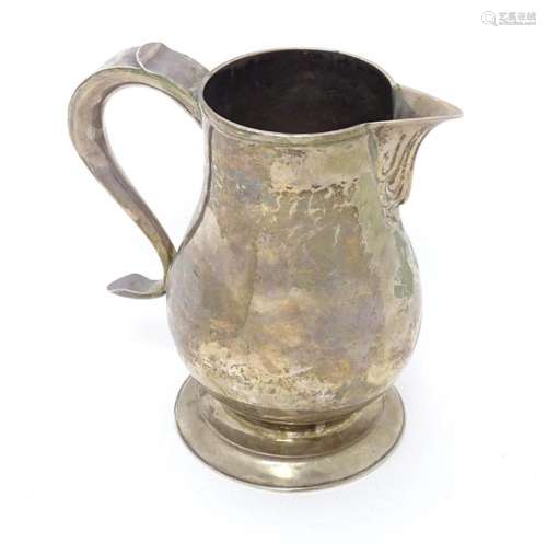 A Geo III silver jug hallmarked Newcastle 1770. Approx. 6&qu...