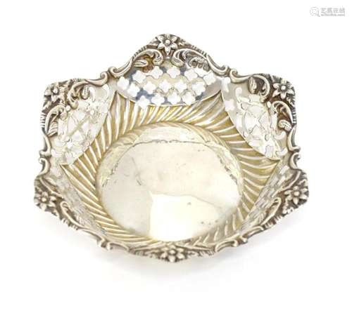 A Victorian silver bonbon dish with pierced decoration, hall...