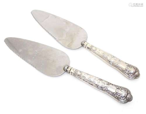 Two pie servers with silver King's pattern handles, hall...