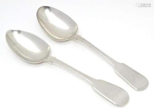 Two silver Fiddle pattern table spoons, on Scottish hallmark...