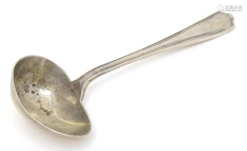 A silver spoon hallmarked Sheffield 1930, maker Martin Hall ...