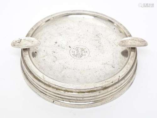 A silver ashtray of circular form, hallmarked Birmingham 195...